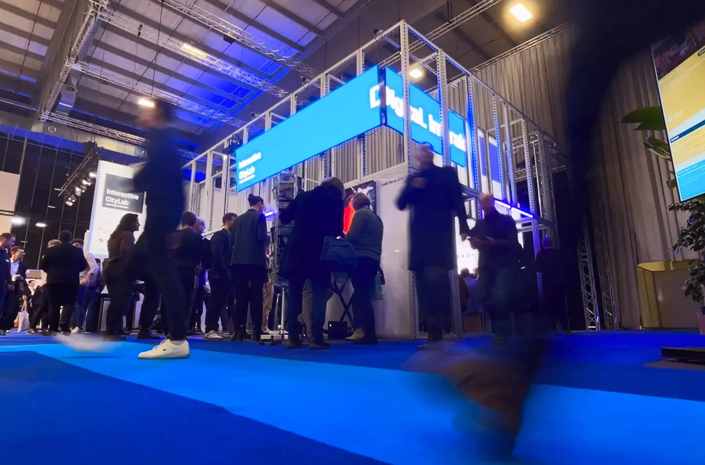 Interactive City Lab booth frame lit in blue at Smart Country Convention