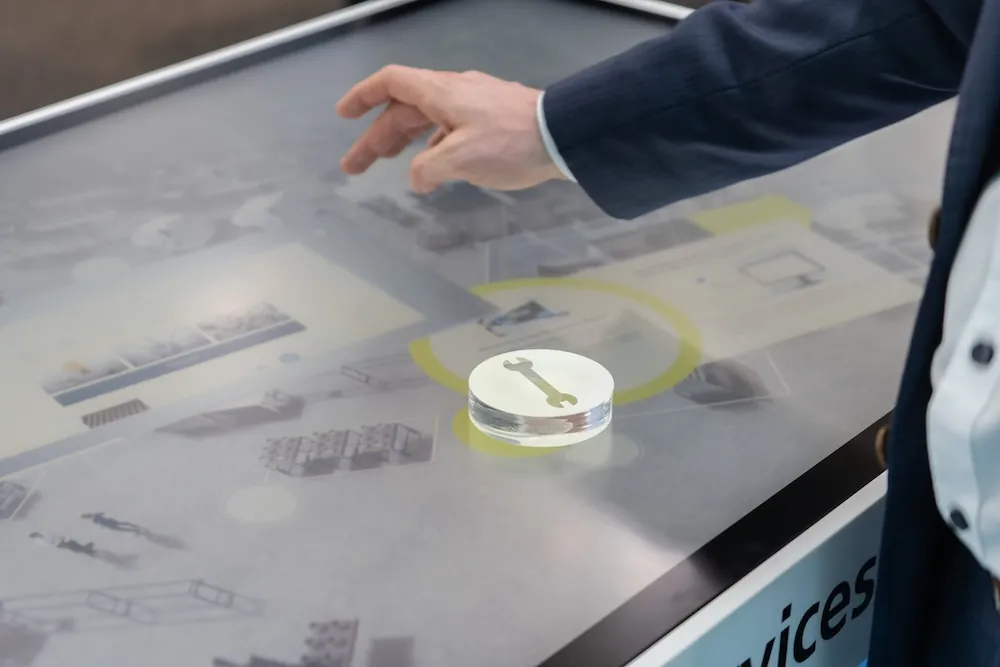 A ring object glowing on the Trumpf interaction table